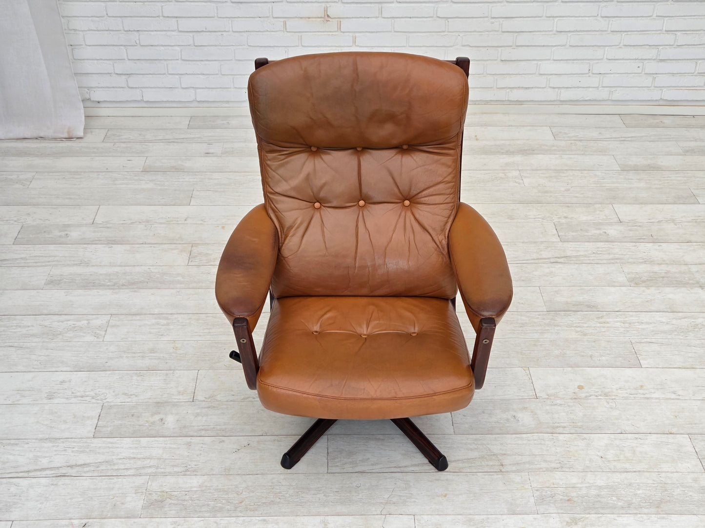 1970s, Swedish design by Gote Möbler, swivel chair with footstool, leather.