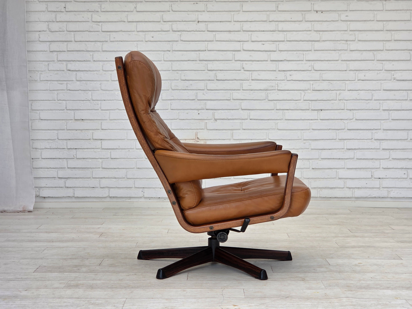 1970s, Swedish design by Gote Möbler, swivel chair with footstool, leather.