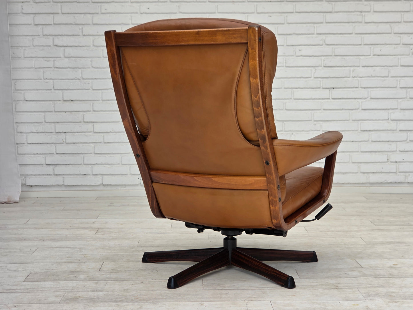 1970s, Swedish design by Gote Möbler, swivel chair with footstool, leather.