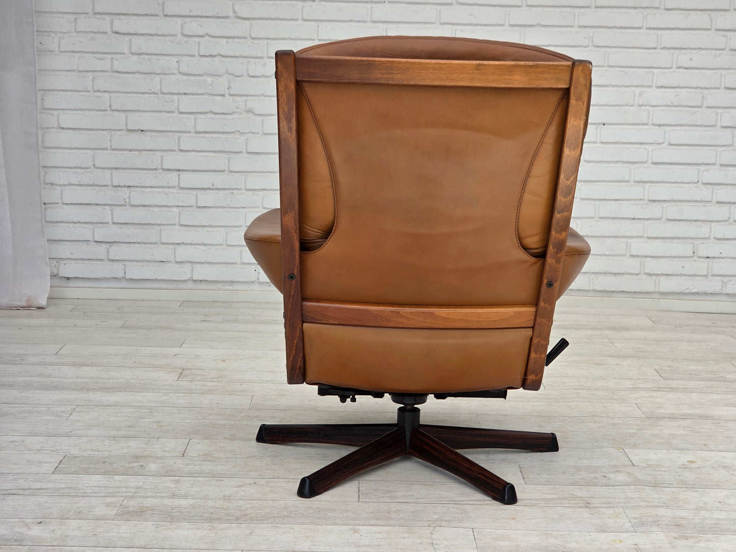 1970s, Swedish design by Gote Möbler, swivel chair with footstool, leather.