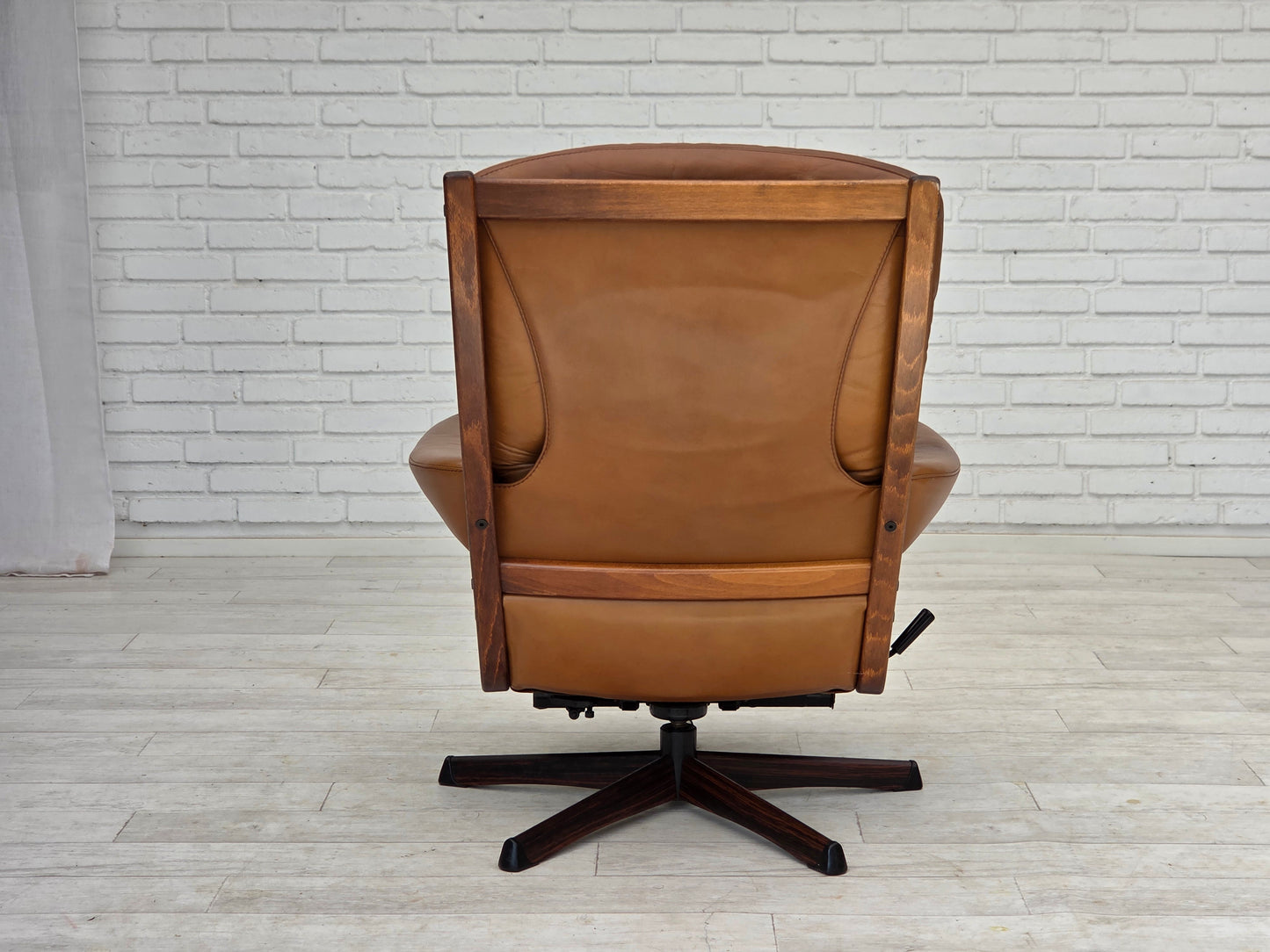 1970s, Swedish design by Gote Möbler, swivel chair with footstool, leather.