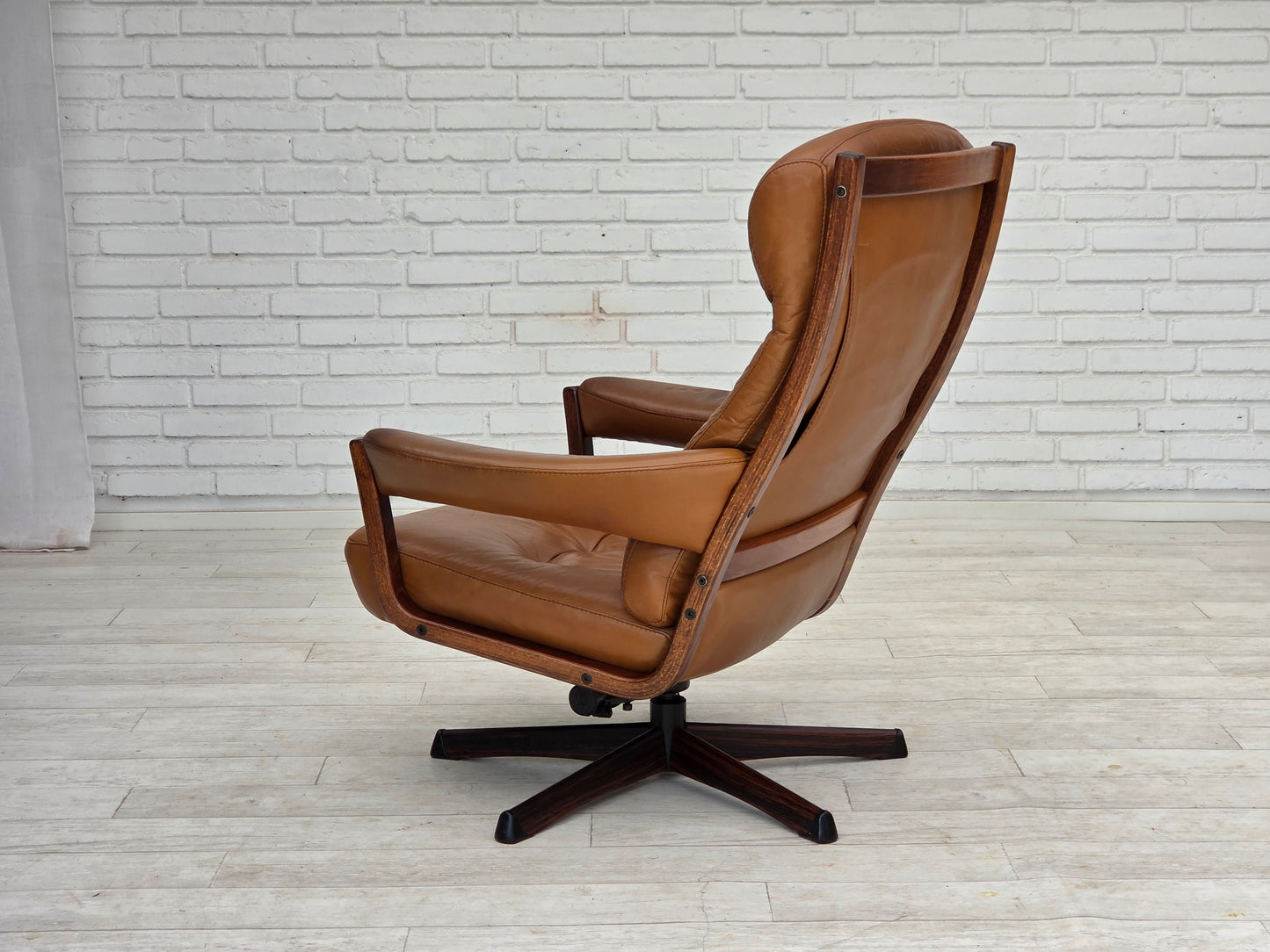 1970s, Swedish design by Gote Möbler, swivel chair with footstool, leather.
