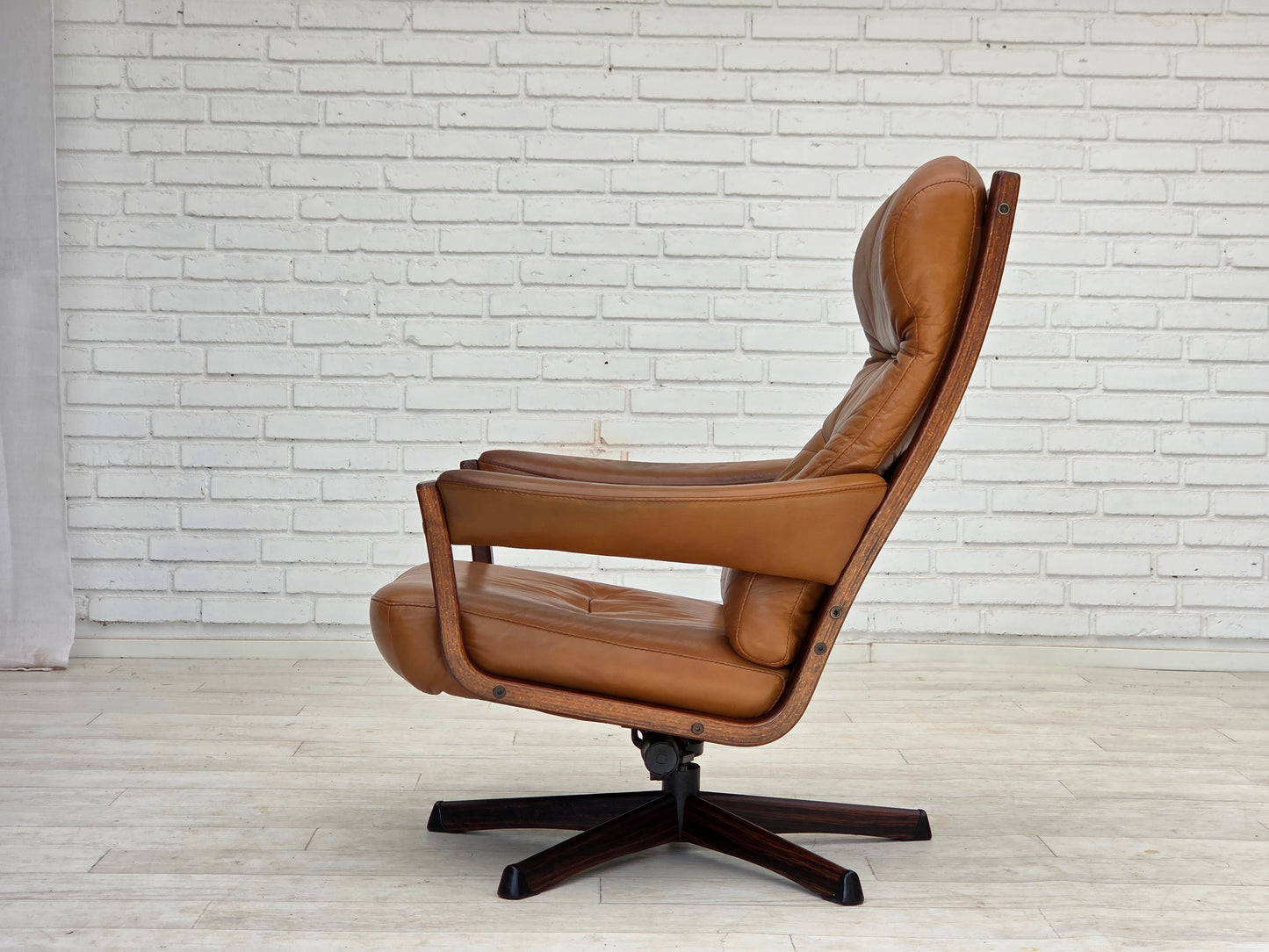 1970s, Swedish design by Gote Möbler, swivel chair with footstool, leather.