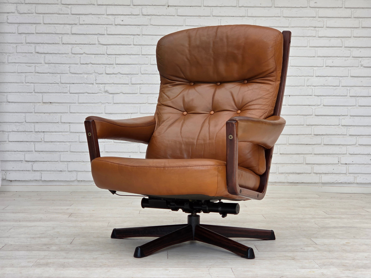 1970s, Swedish design by Gote Möbler, swivel chair with footstool, leather.