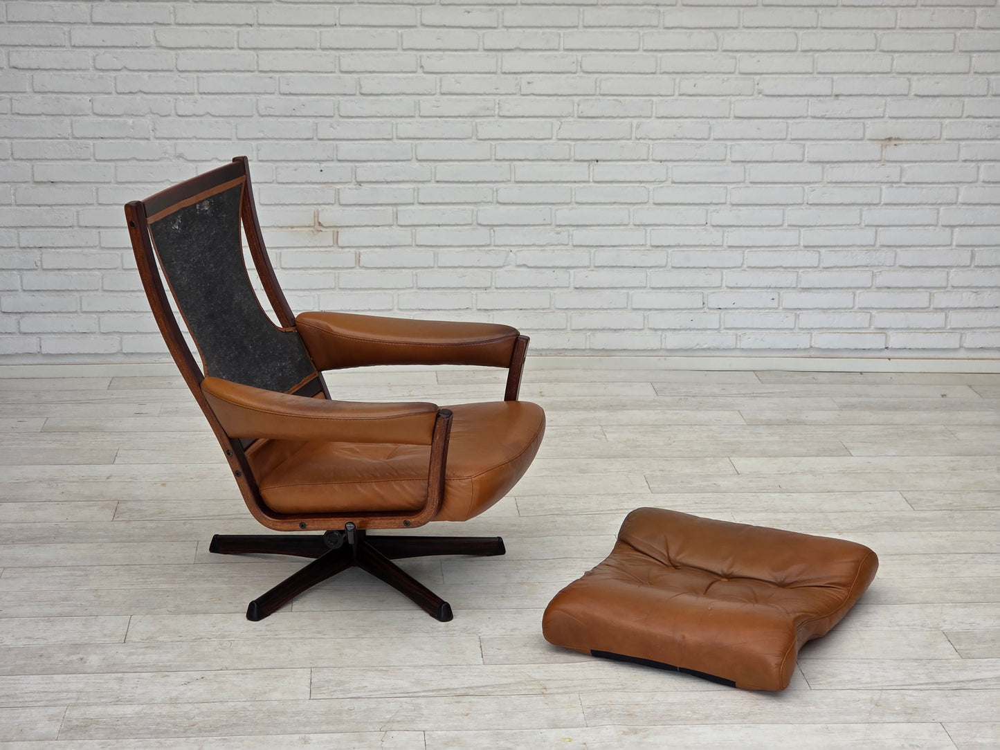 1970s, Swedish design by Gote Möbler, swivel chair with footstool, leather.