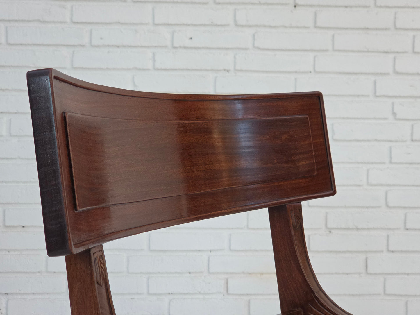 1920-30s, carved wood armchair, design after Georges Jacob, reupholstered.