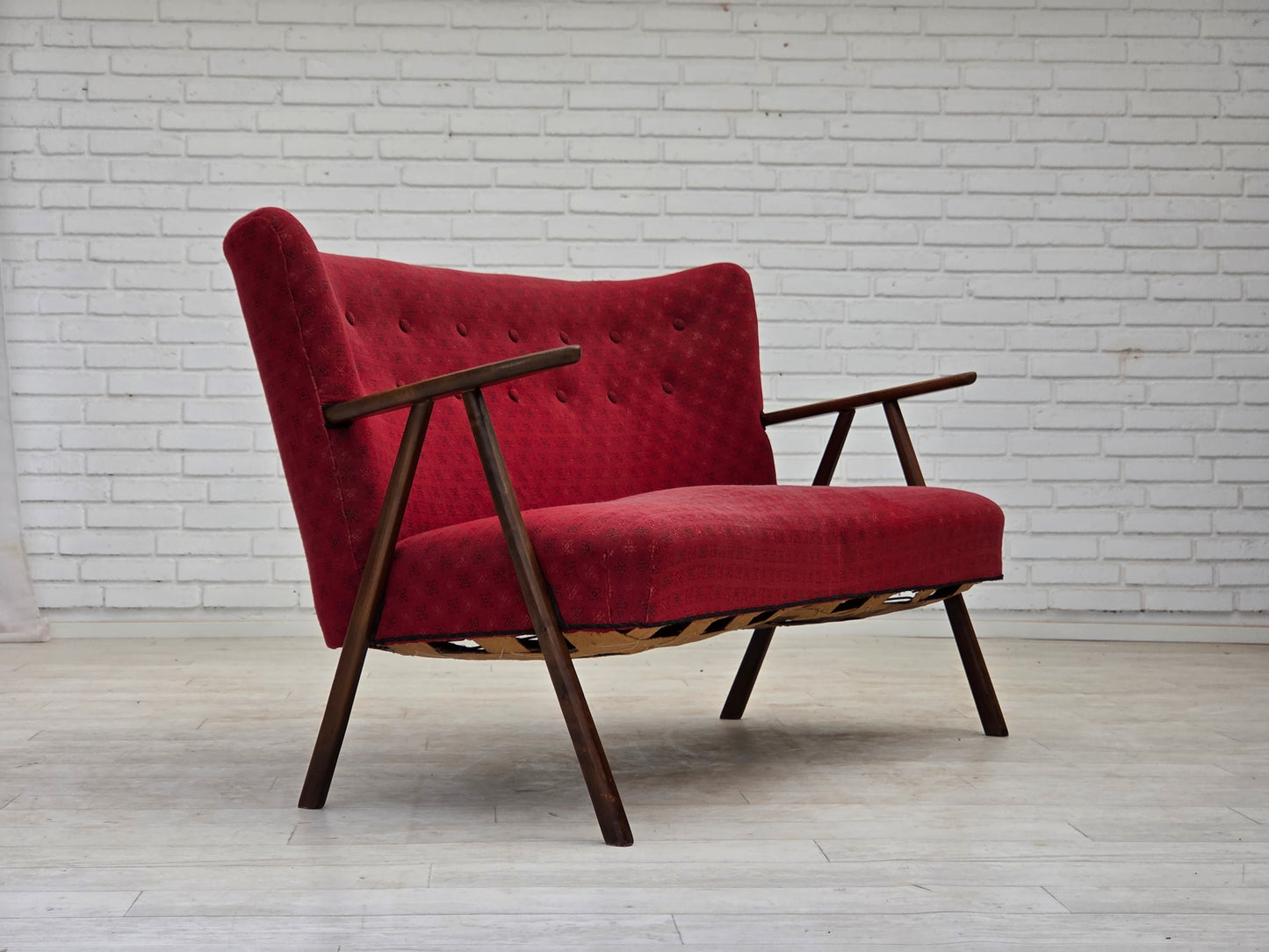 1960s, Danish 2-seater sofa, red furniture fabric, beech wood legs and armrests.
