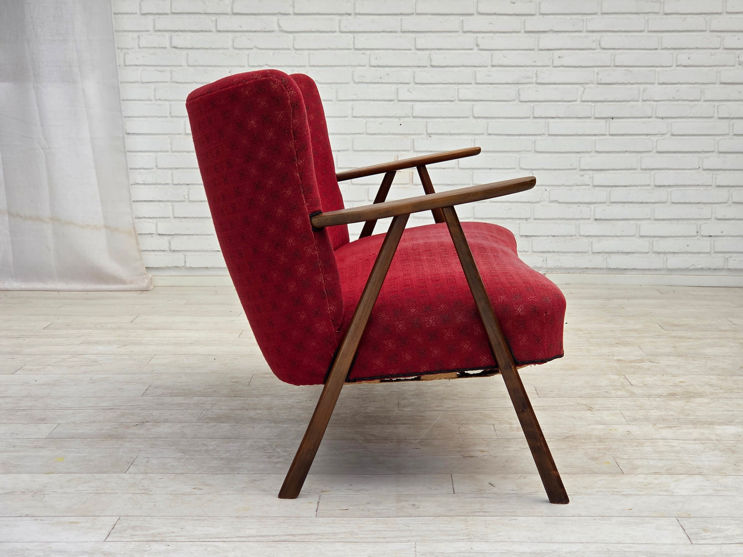 1960s, Danish 2-seater sofa, red furniture fabric, beech wood legs and armrests.