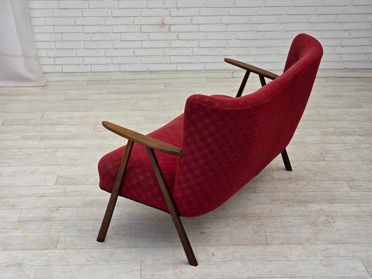 1960s, Danish 2-seater sofa, red furniture fabric, beech wood legs and armrests.