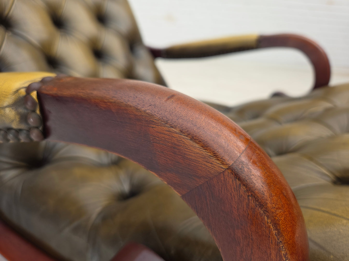1950s, Chesterfield rocking chair, original green furniture leather, teak wood.