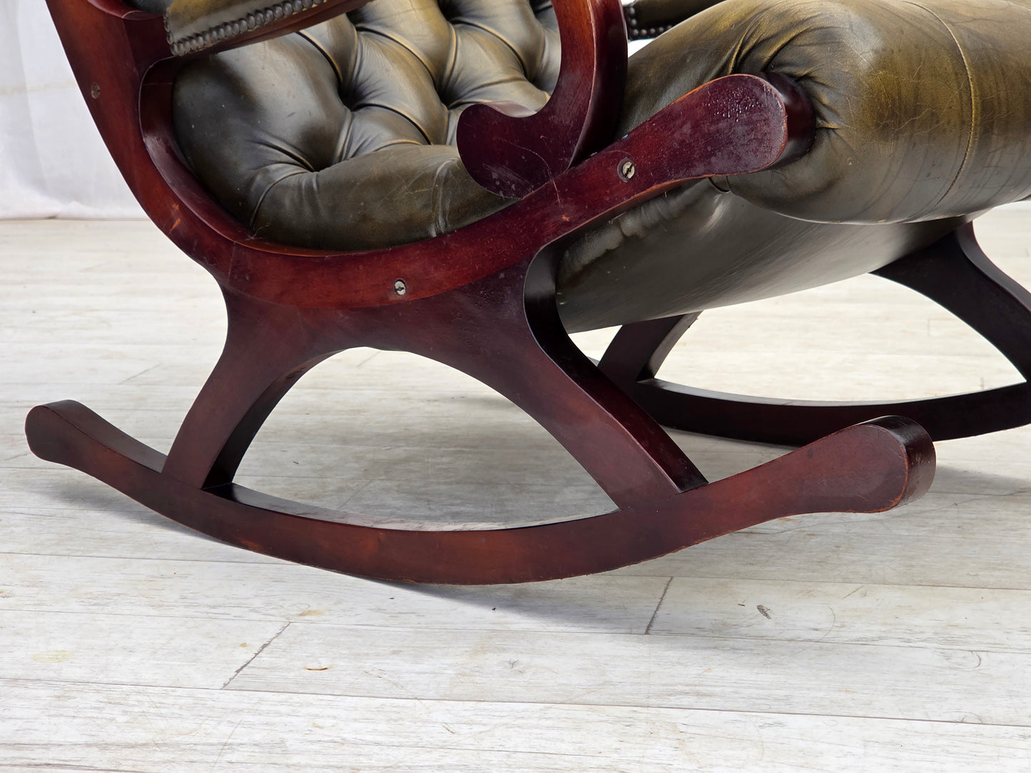 1950s, Chesterfield rocking chair, original green furniture leather, teak wood.