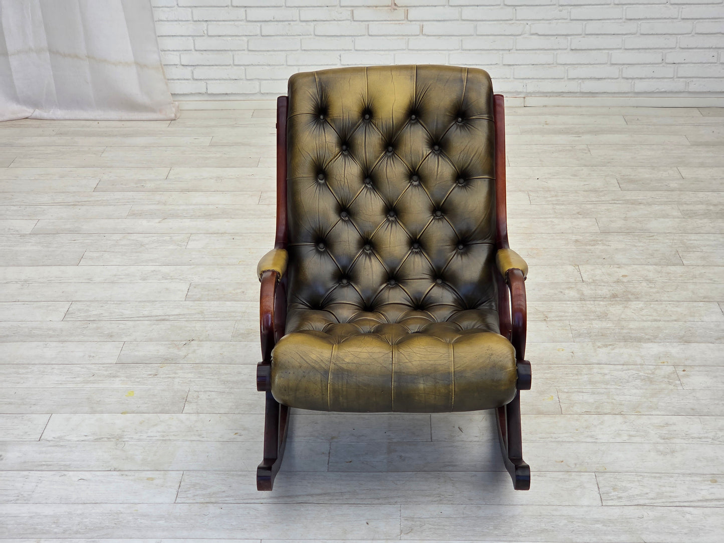 1950s, Chesterfield rocking chair, original green furniture leather, teak wood.