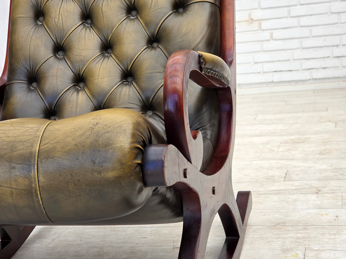 1950s, Chesterfield rocking chair, original green furniture leather, teak wood.