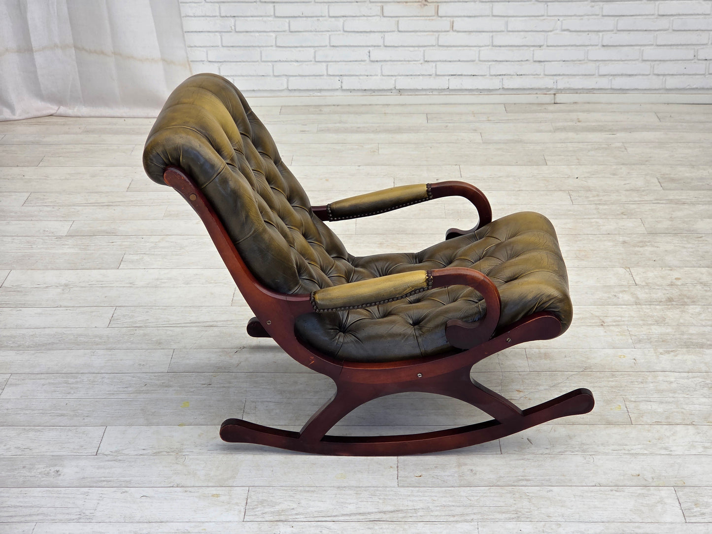 1950s, Chesterfield rocking chair, original green furniture leather, teak wood.