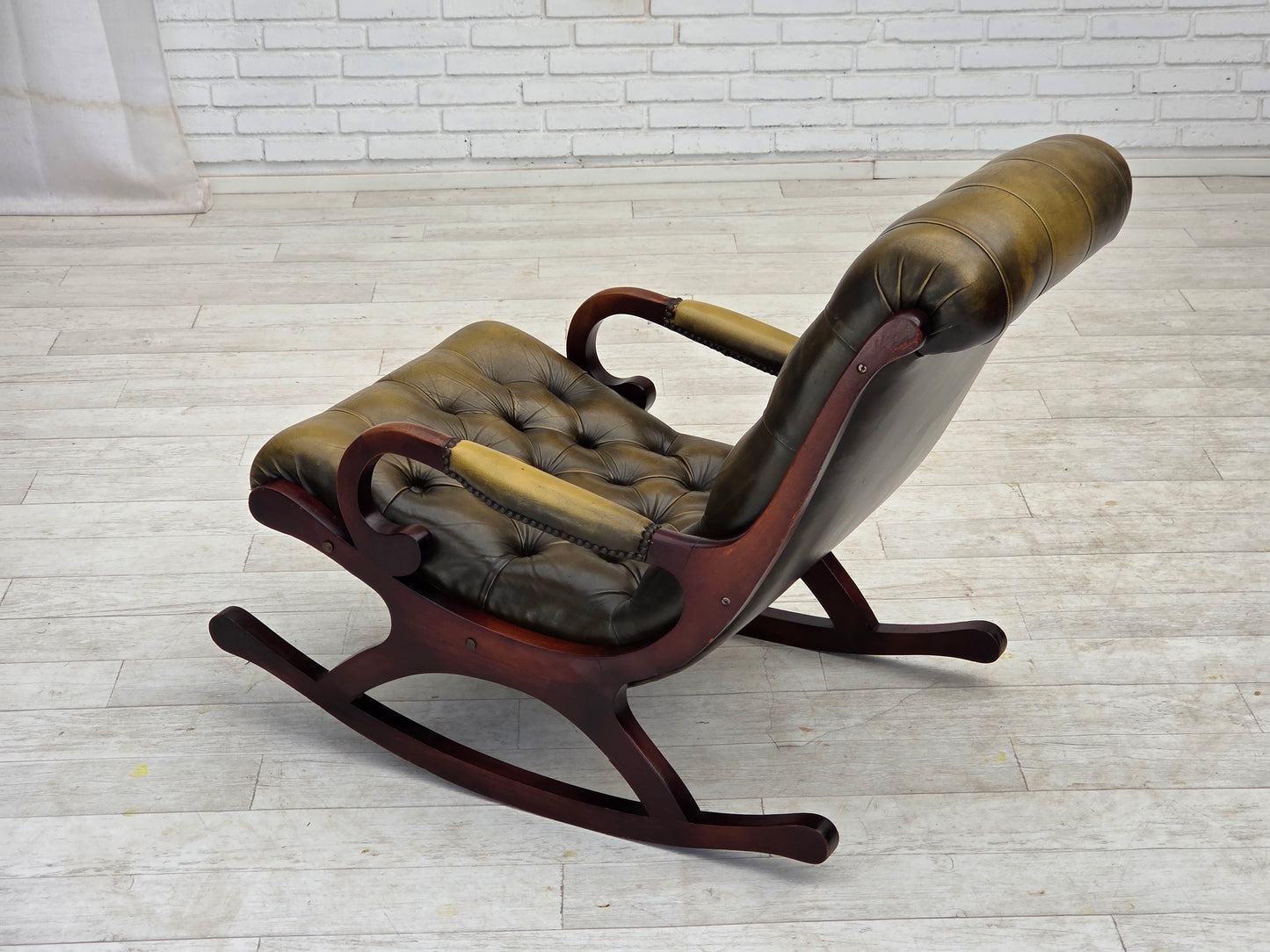 1950s, Chesterfield rocking chair, original green furniture leather, teak wood.