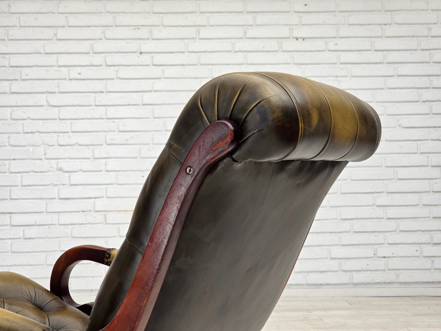 1950s, Chesterfield rocking chair, original green furniture leather, teak wood.