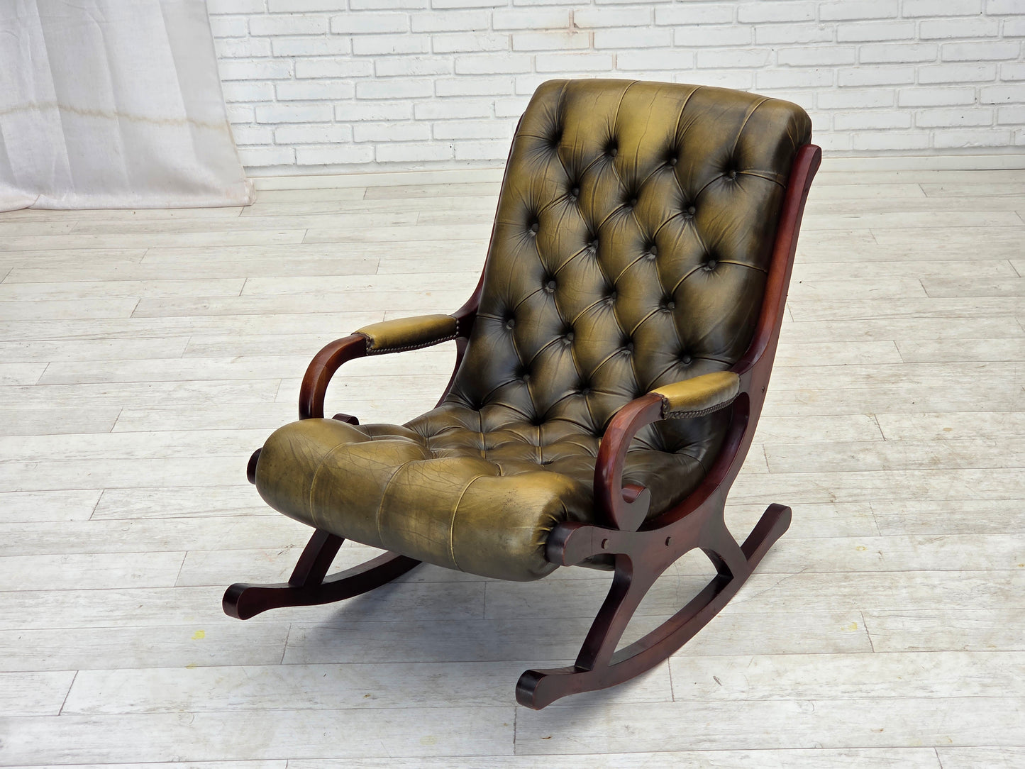 1950s, Chesterfield rocking chair, original green furniture leather, teak wood.