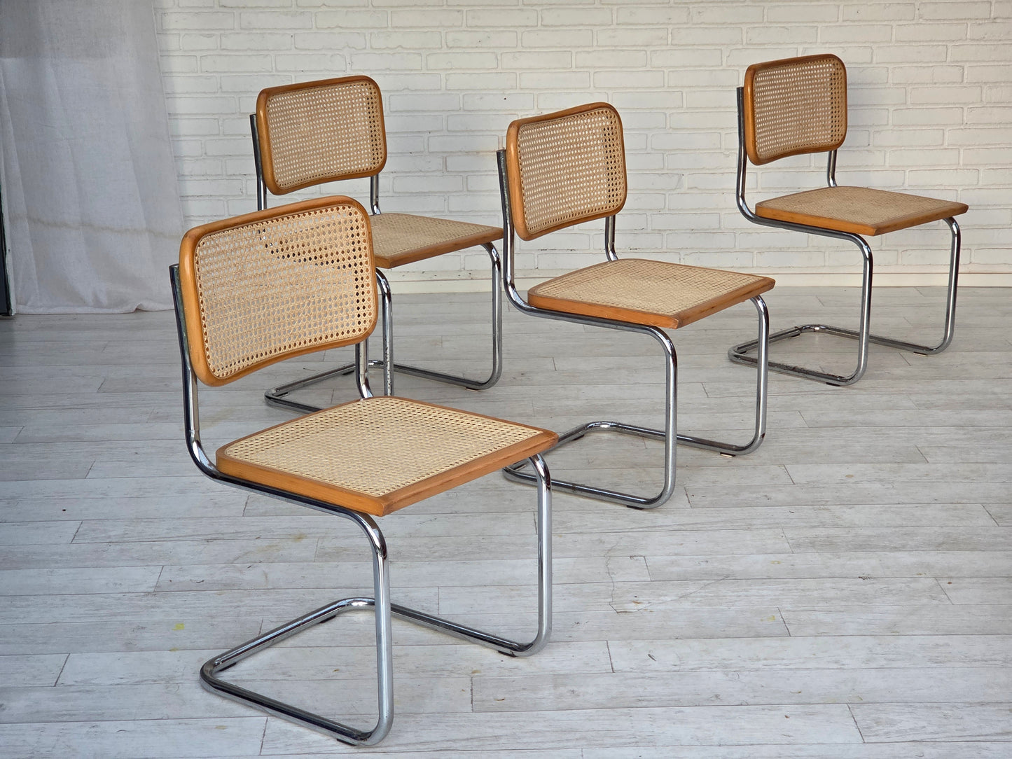 1970s, set of 4 Italian chairs in Bauhaus style, chrome steel, beech wood, furniture mesh.