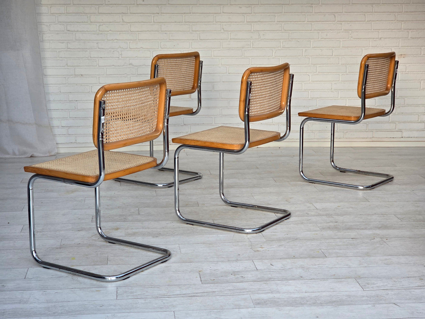 1970s, set of 4 Italian chairs in Bauhaus style, chrome steel, beech wood, furniture mesh.