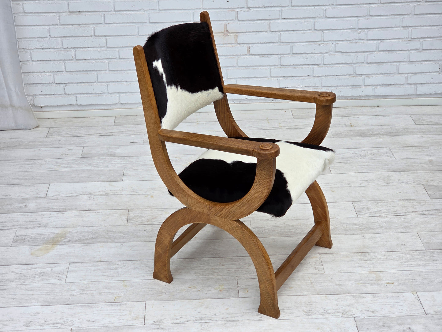 1960s, Danish highback armchair, genuine cowhide, oak wood, reupholstered.