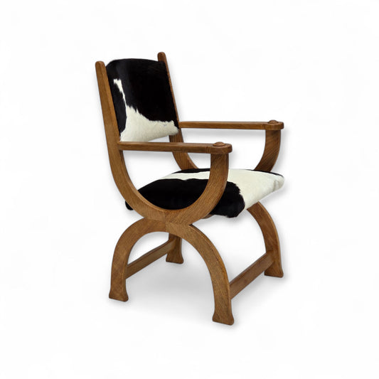 1960s, Danish highback armchair, genuine cowhide, oak wood, reupholstered.
