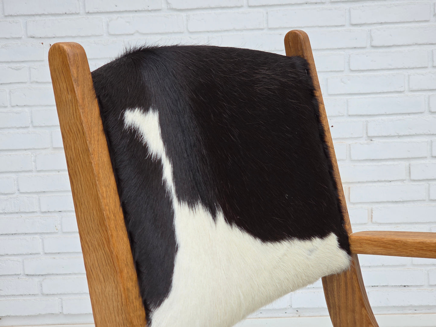 1960s, Danish highback armchair, genuine cowhide, oak wood, reupholstered.