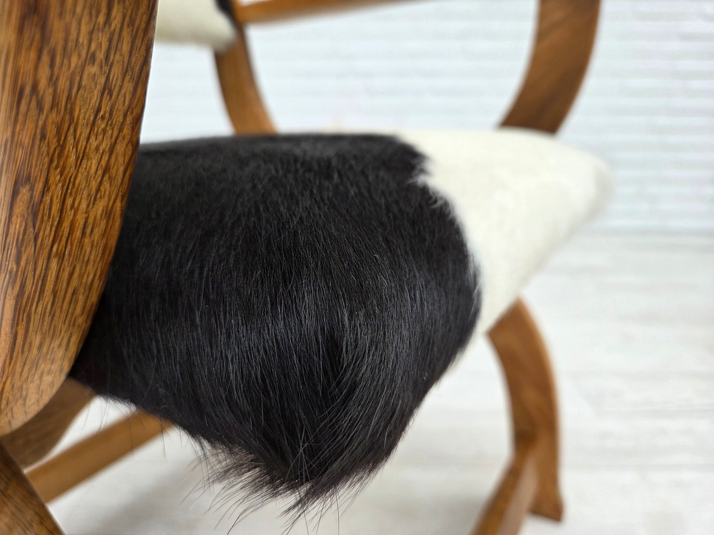 1960s, Danish highback armchair, genuine cowhide, oak wood, reupholstered.
