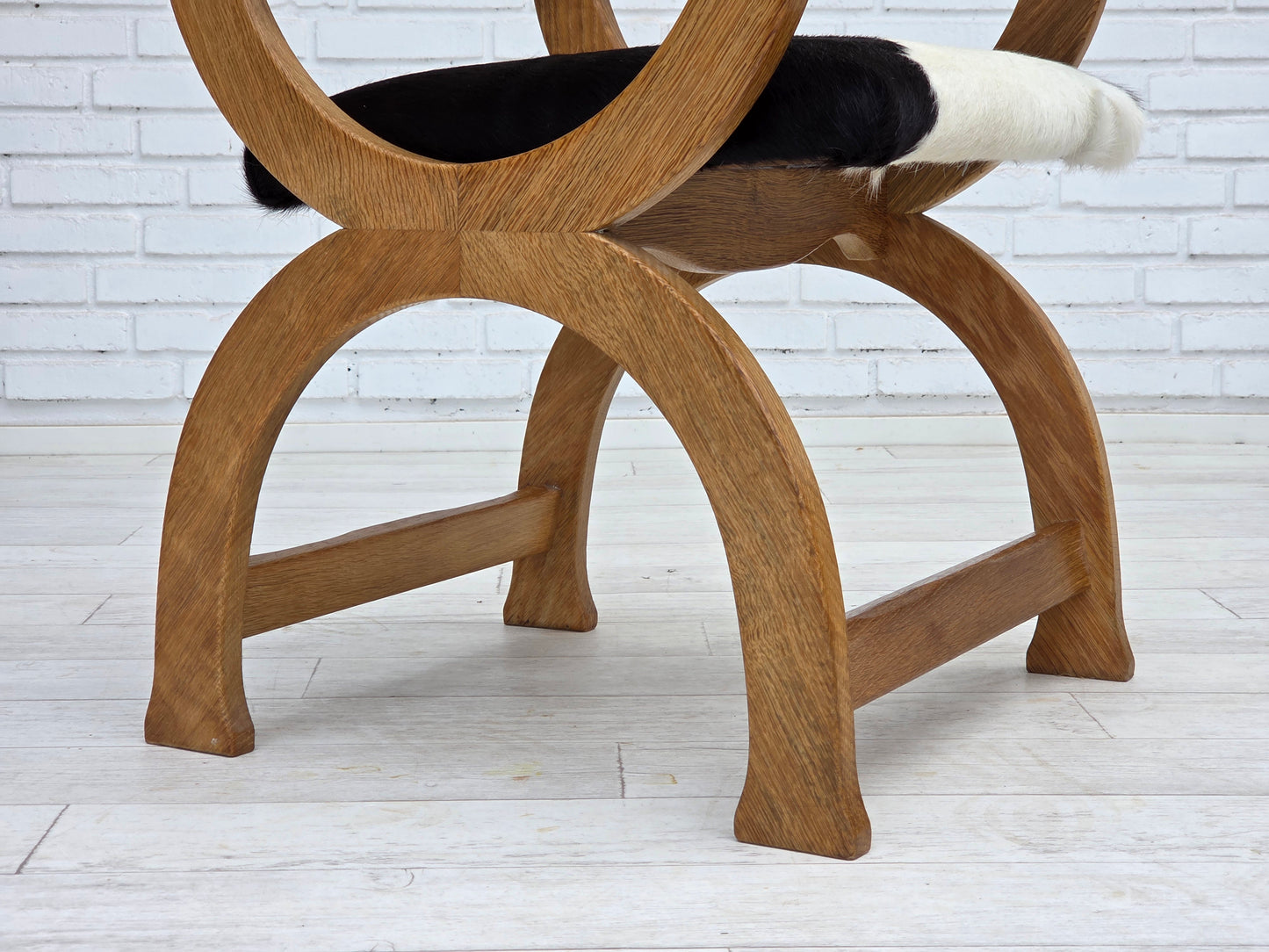 1960s, Danish highback armchair, genuine cowhide, oak wood, reupholstered.