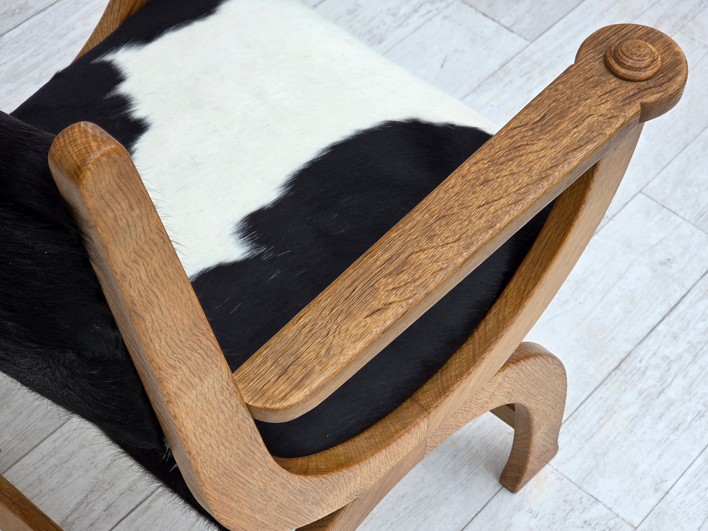 1960s, Danish highback armchair, genuine cowhide, oak wood, reupholstered.
