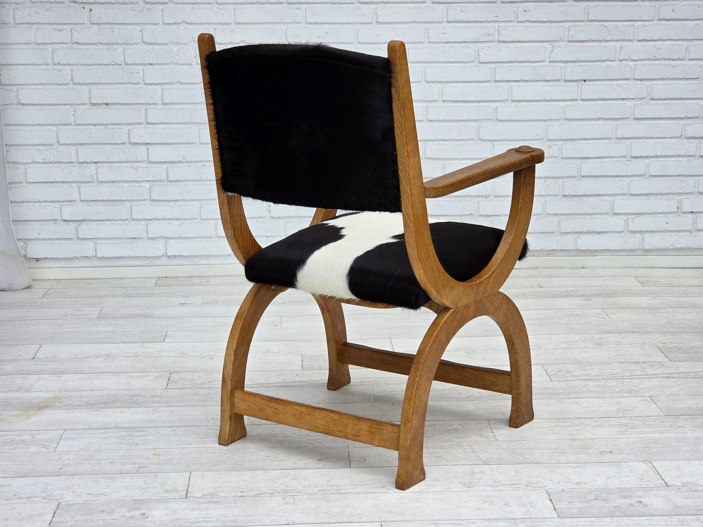 1960s, Danish highback armchair, genuine cowhide, oak wood, reupholstered.