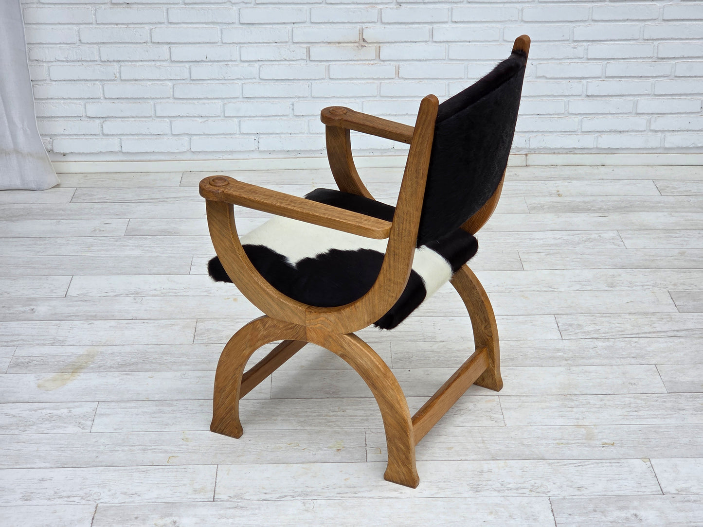 1960s, Danish highback armchair, genuine cowhide, oak wood, reupholstered.