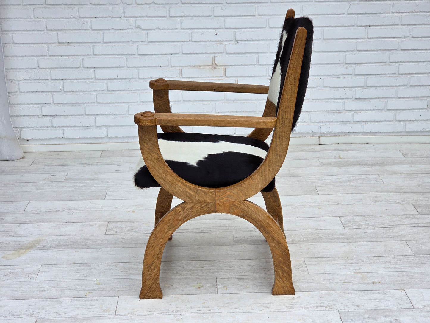 1960s, Danish highback armchair, genuine cowhide, oak wood, reupholstered.