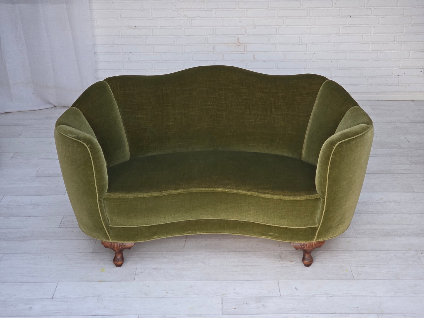 1960s, Danish curved 2-seater sofa, green furniture velour, oak wood legs.