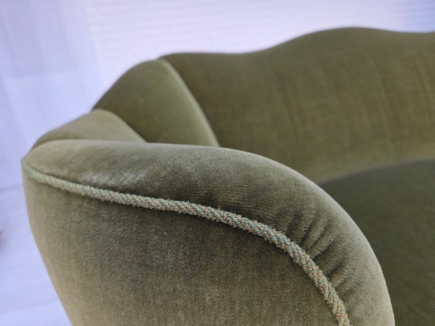 1960s, Danish curved 2-seater sofa, green furniture velour, oak wood legs.