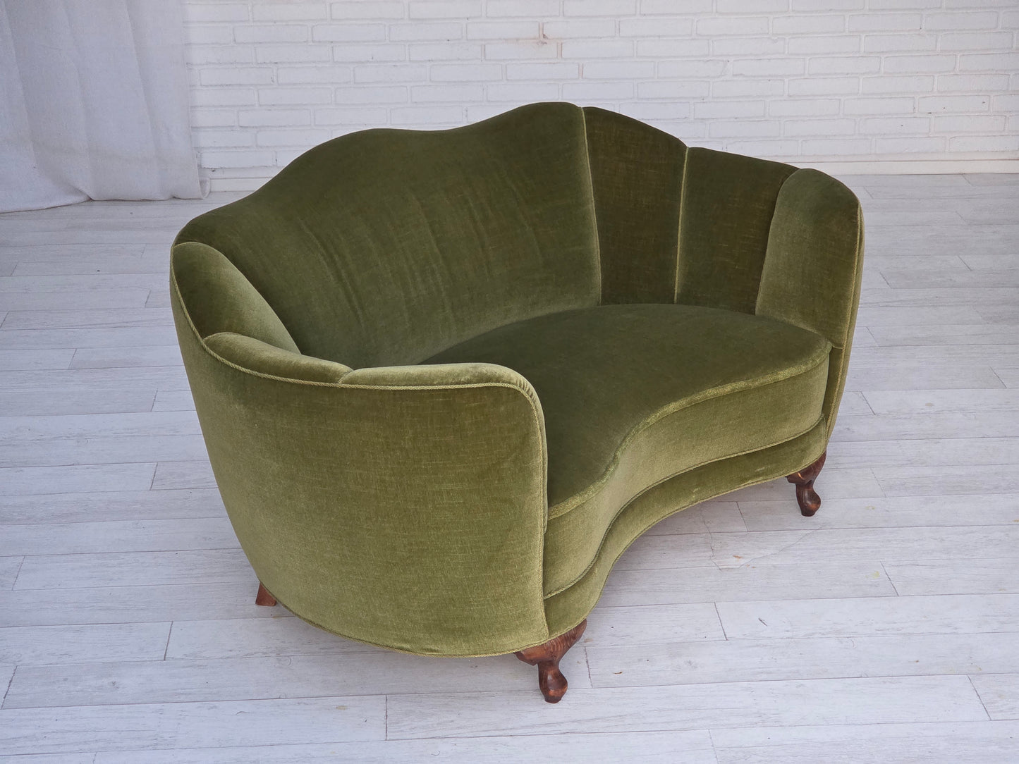 1960s, Danish curved 2-seater sofa, green furniture velour, oak wood legs.