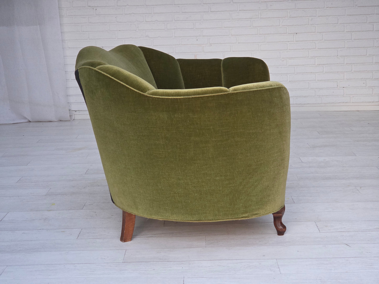 1960s, Danish curved 2-seater sofa, green furniture velour, oak wood legs.
