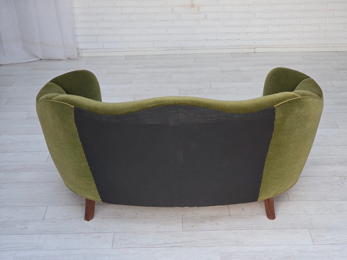 1960s, Danish curved 2-seater sofa, green furniture velour, oak wood legs.