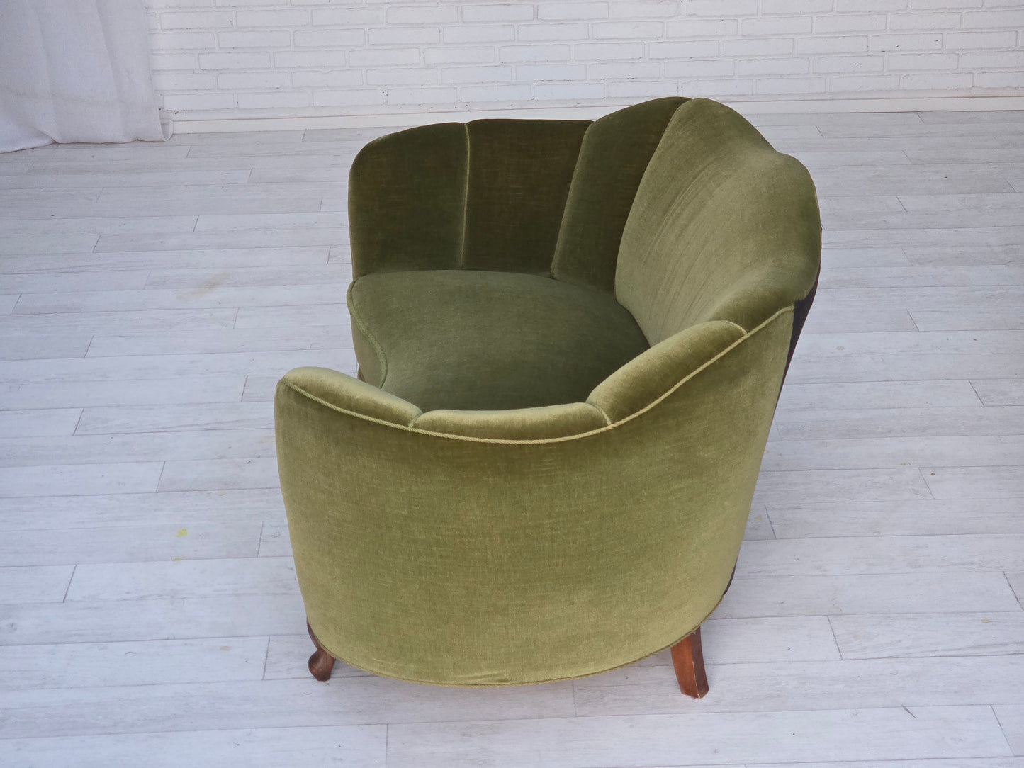 1960s, Danish curved 2-seater sofa, green furniture velour, oak wood legs.
