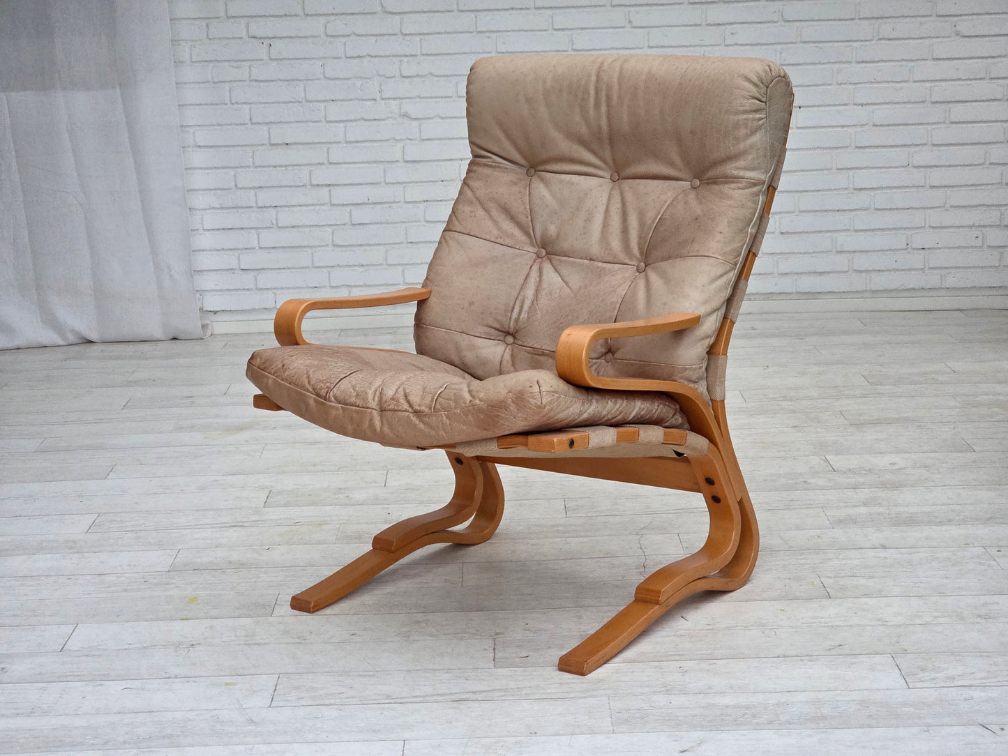 1970s, Norwegian armchair, model "Kengu", beige furniture leather.
