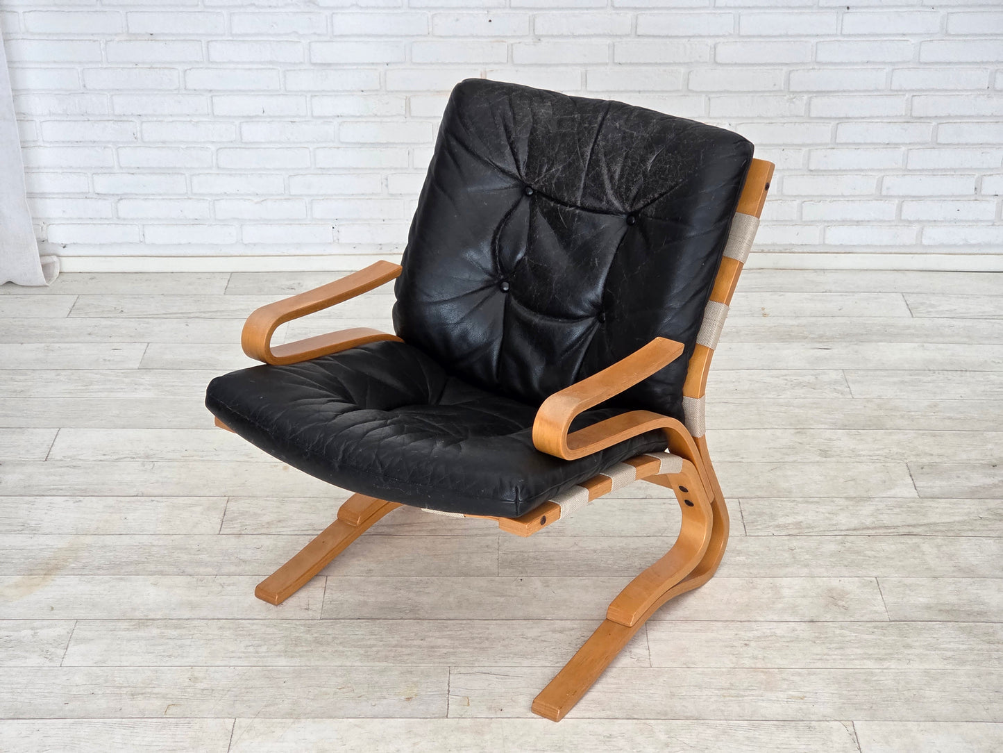 1970s, Norwegian design, armchair model "Kengu", leather, bent wood.