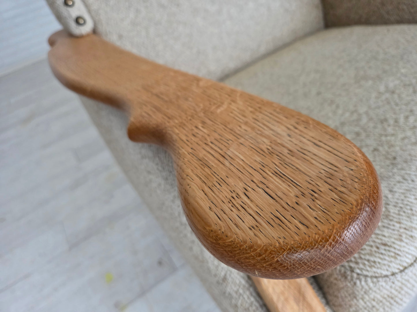 1970s, Danish highback armchair, furniture wool, solid oak wood.