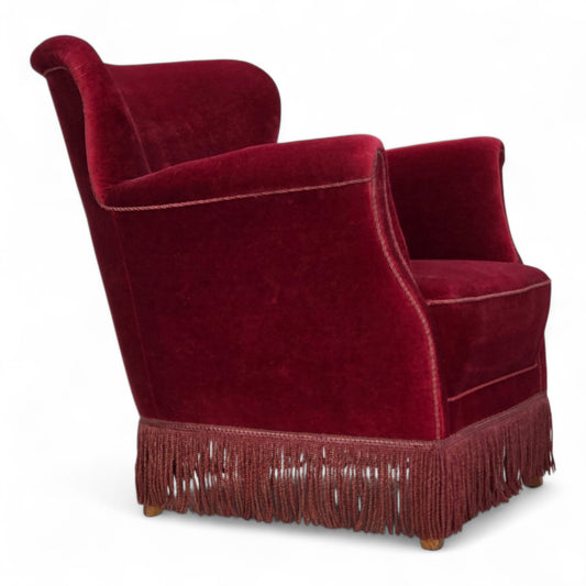 1970s, Danish armchair, cherry-red furniture velour, oak wood legs.