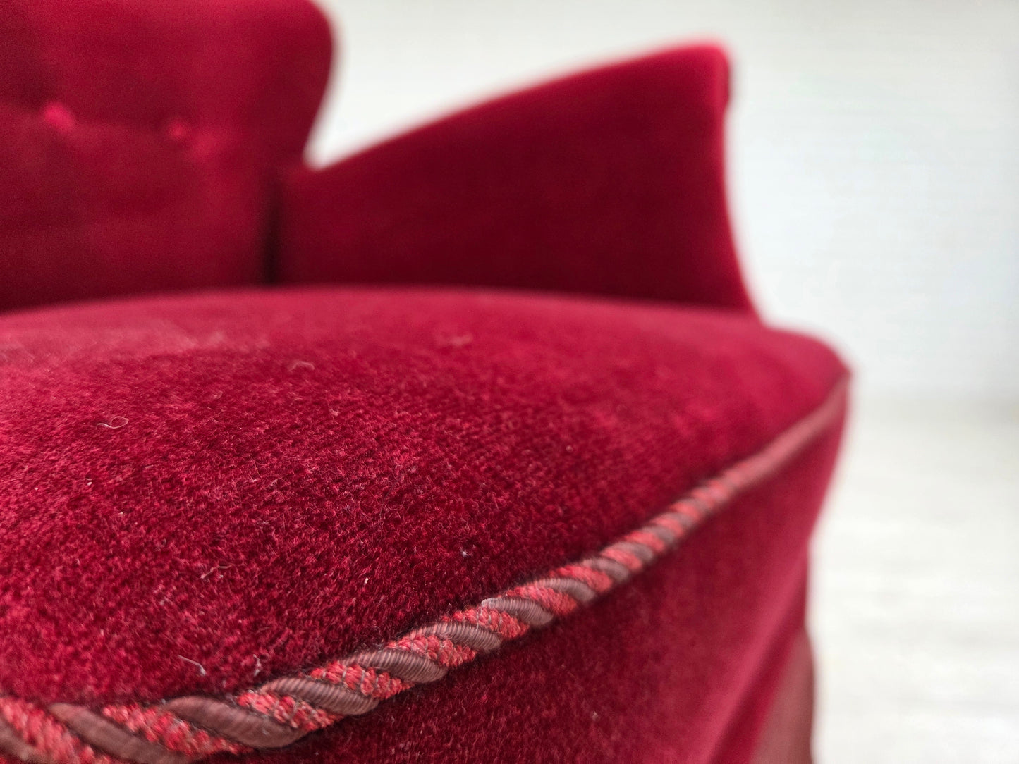 1970s, Danish armchair, cherry-red furniture velour, oak wood legs.