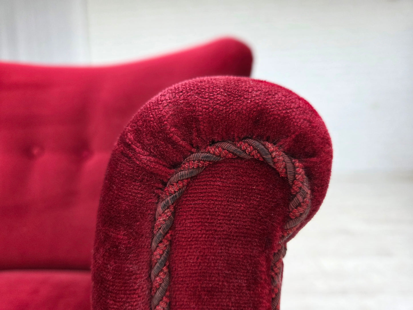 1970s, Danish armchair, cherry-red furniture velour, oak wood legs.