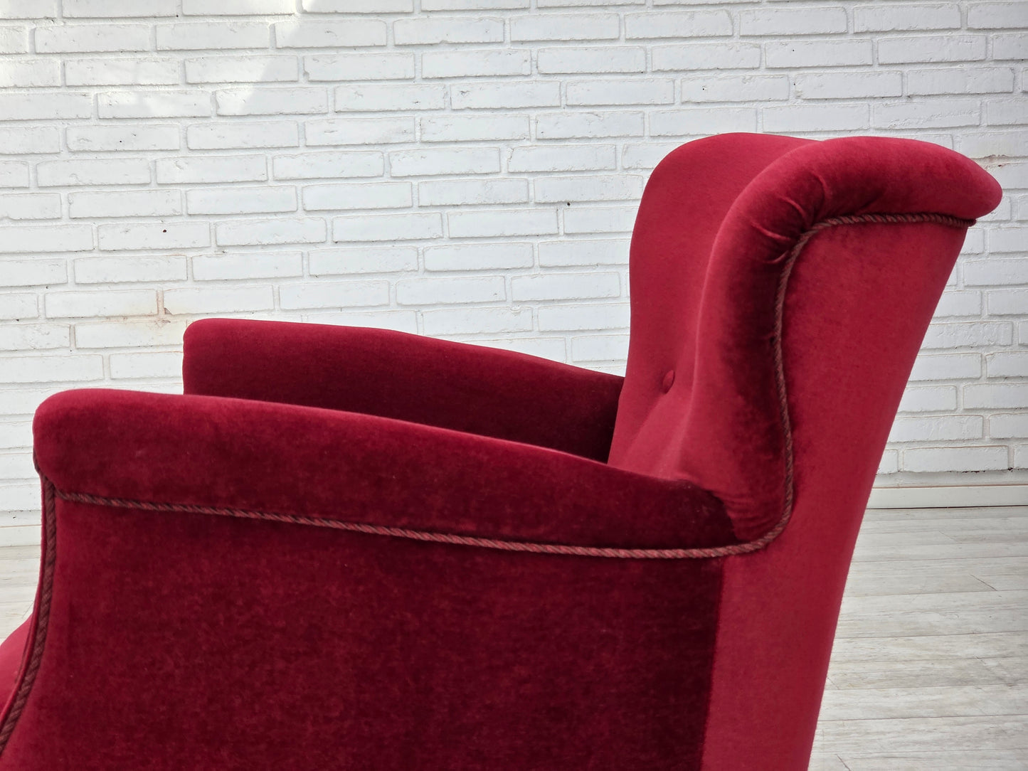 1970s, Danish armchair, cherry-red furniture velour, oak wood legs.