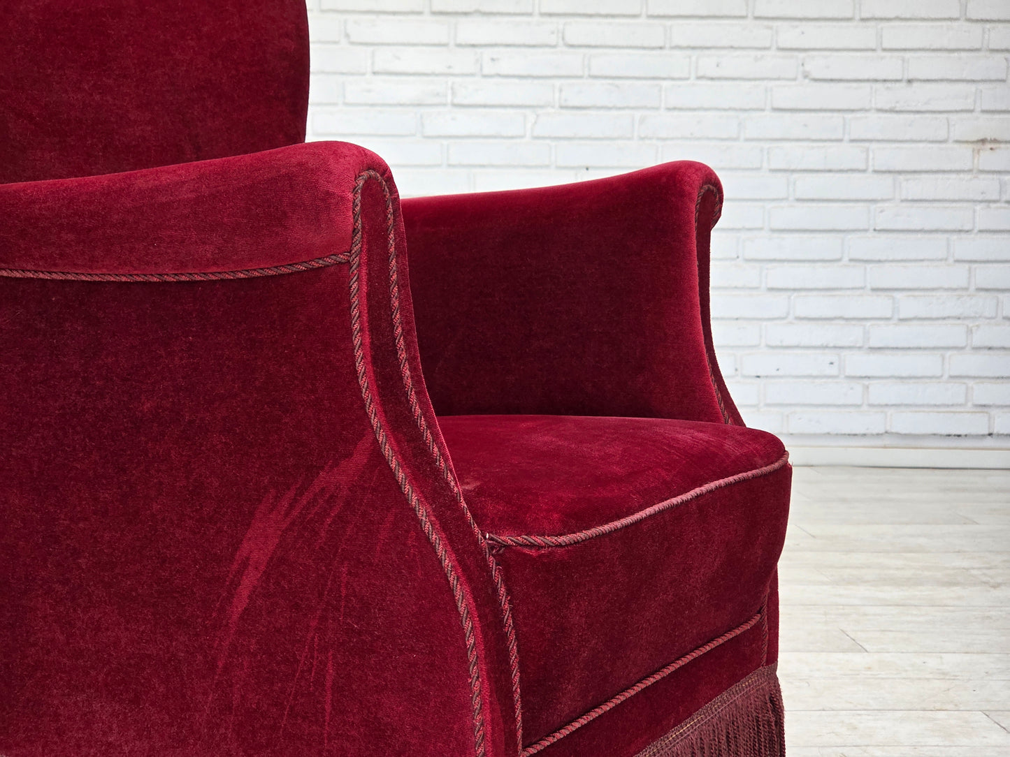 1970s, Danish armchair, cherry-red furniture velour, oak wood legs.