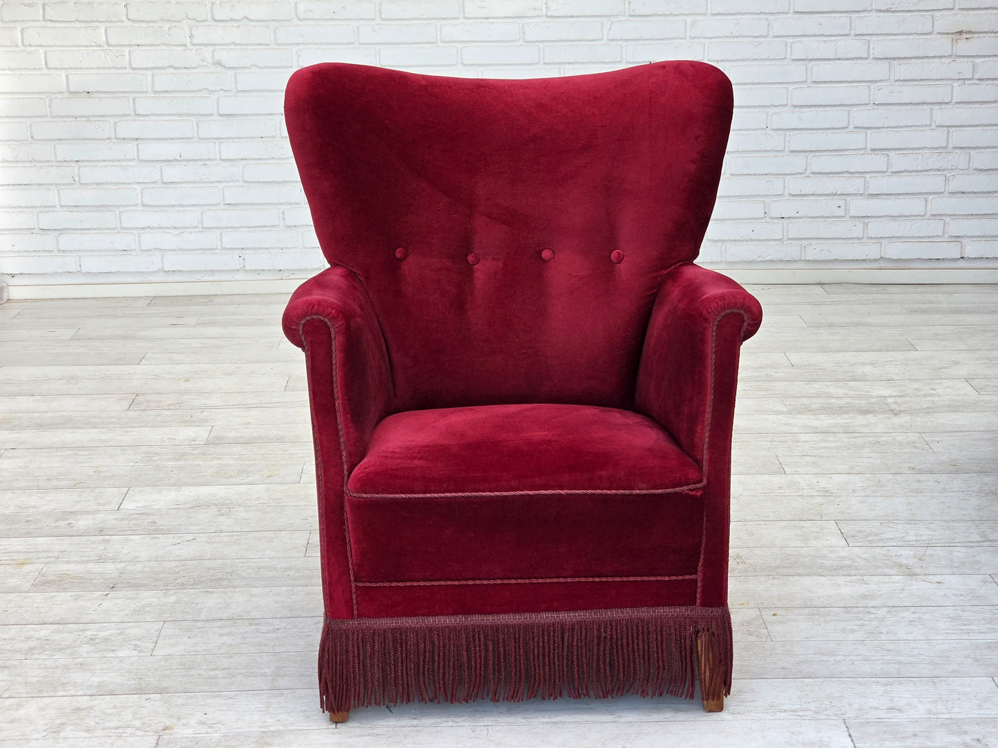 1970s, Danish armchair, cherry-red furniture velour, oak wood legs.