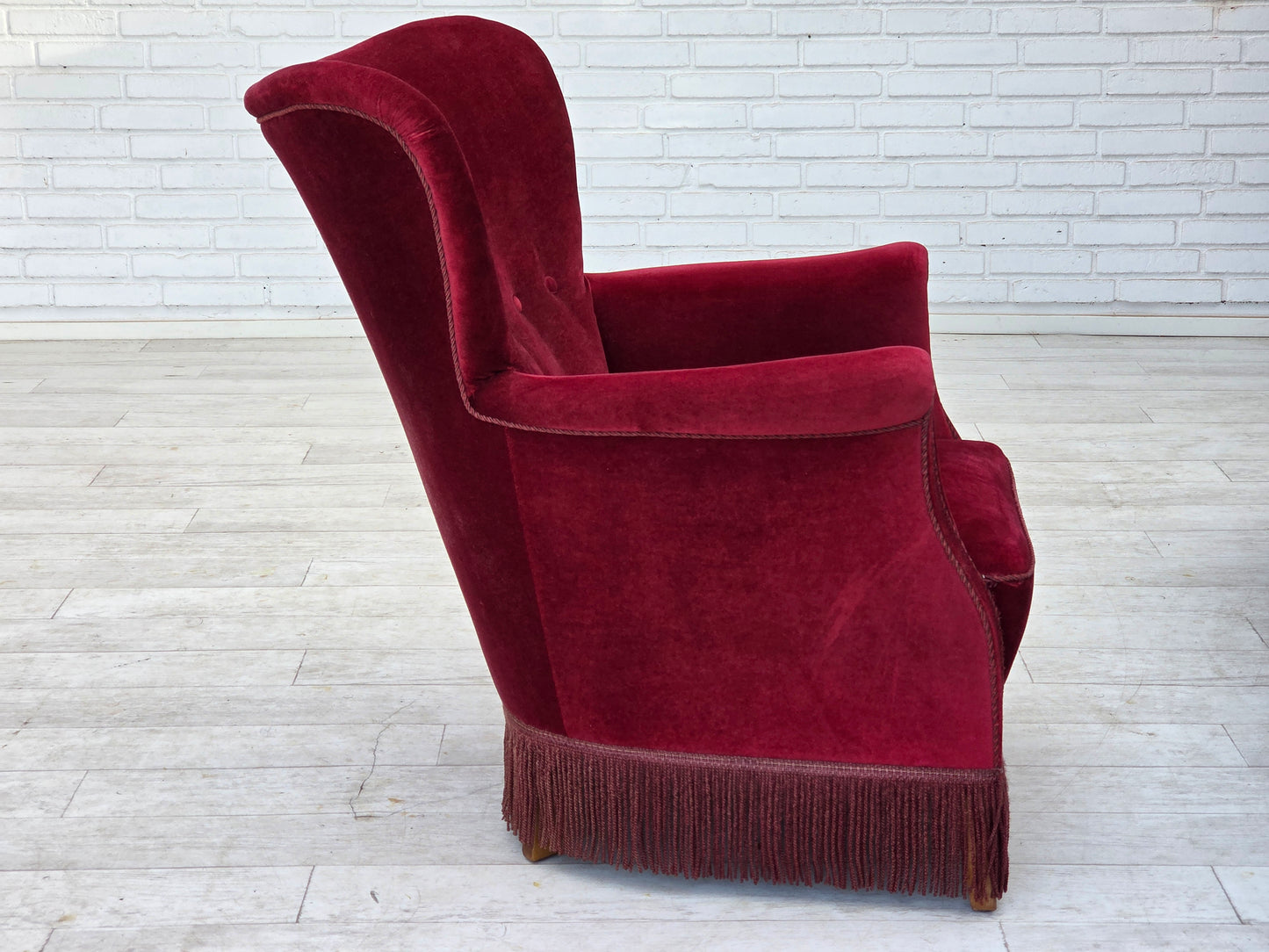 1970s, Danish armchair, cherry-red furniture velour, oak wood legs.