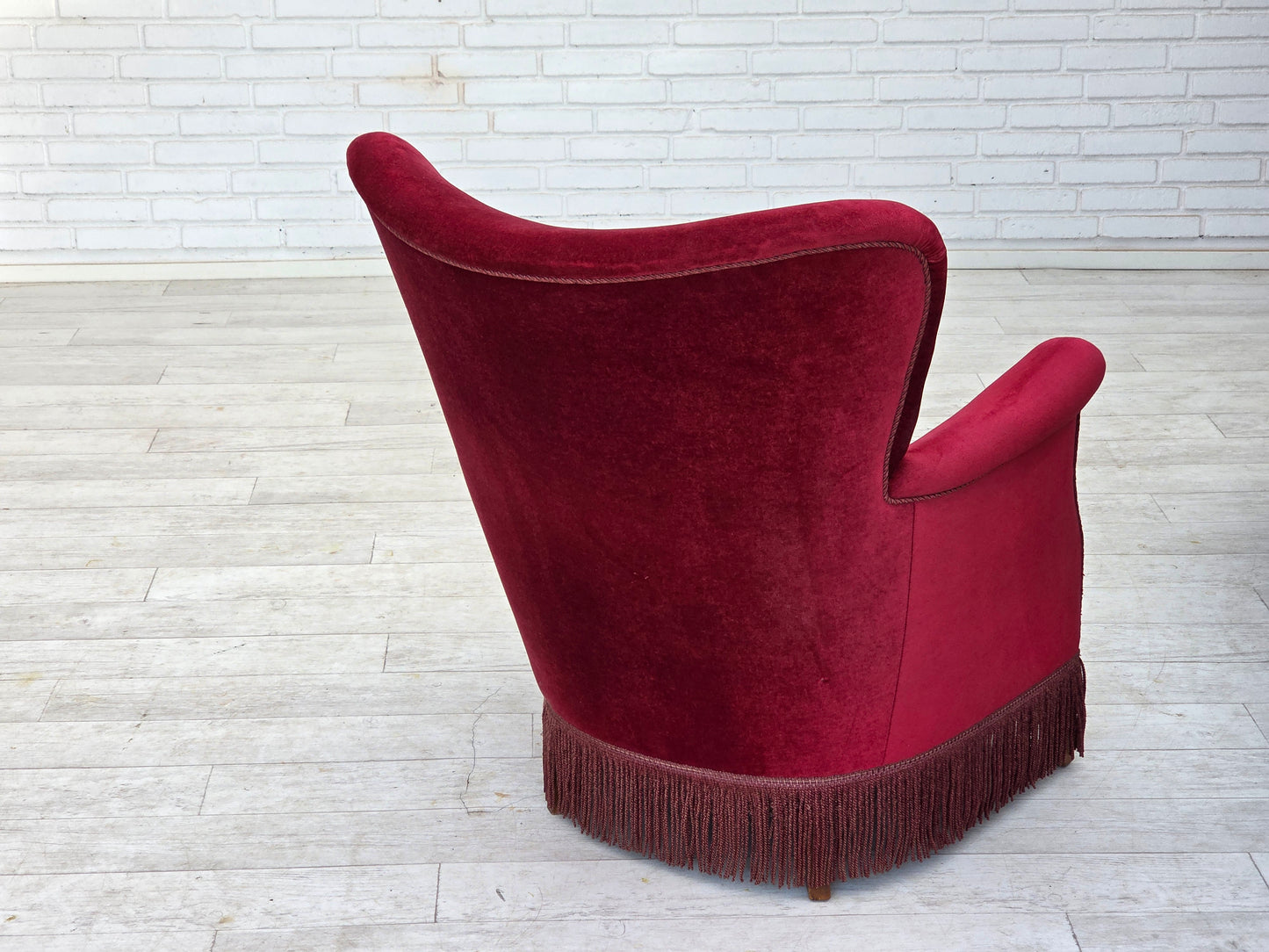 1970s, Danish armchair, cherry-red furniture velour, oak wood legs.