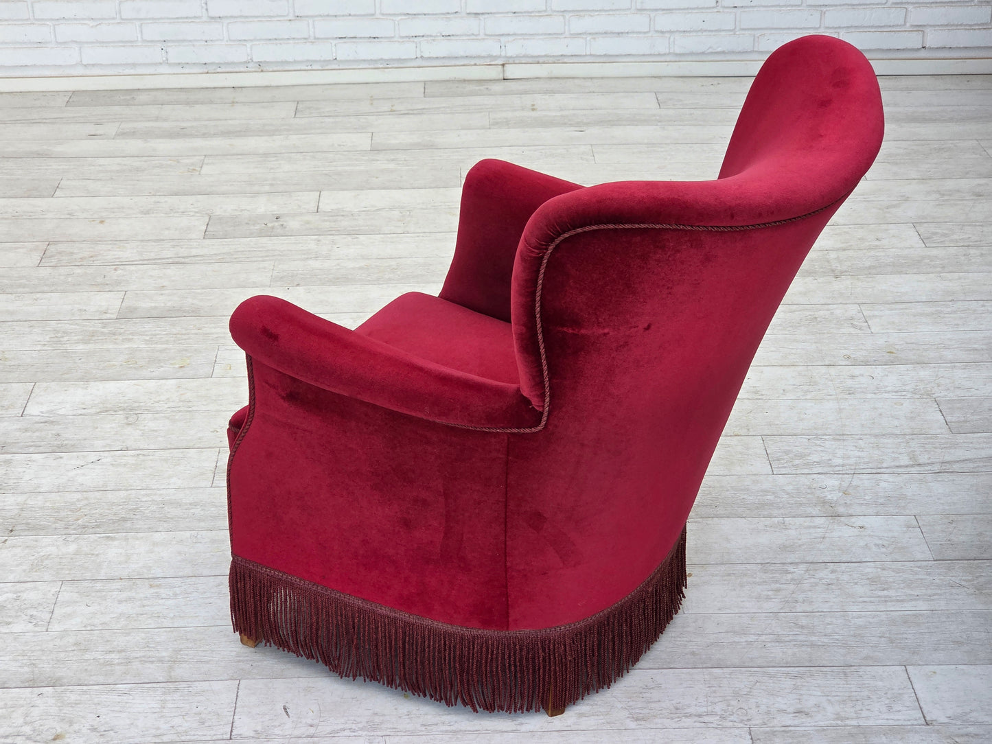 1970s, Danish armchair, cherry-red furniture velour, oak wood legs.